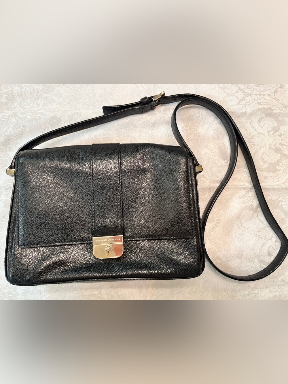 Kate Spade Black Leather Crossbody with Gold Tone Pinch Lock Clasp